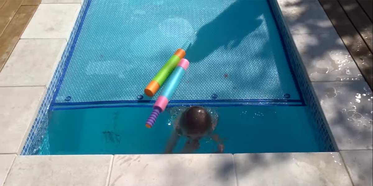 Can I Swim With A Pool Cover On